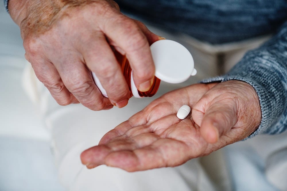 Elderly Patient Taking Medication