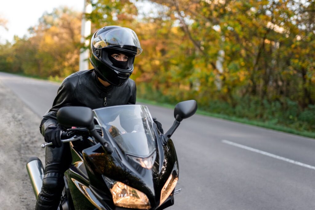 Wearing a helmet and appropriate gear can help save your life in a motorcycle accident.