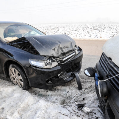 Winter vehicle accident on snowy Kentucky road - Personal injury attorneys Saladino & Schaaf can help.